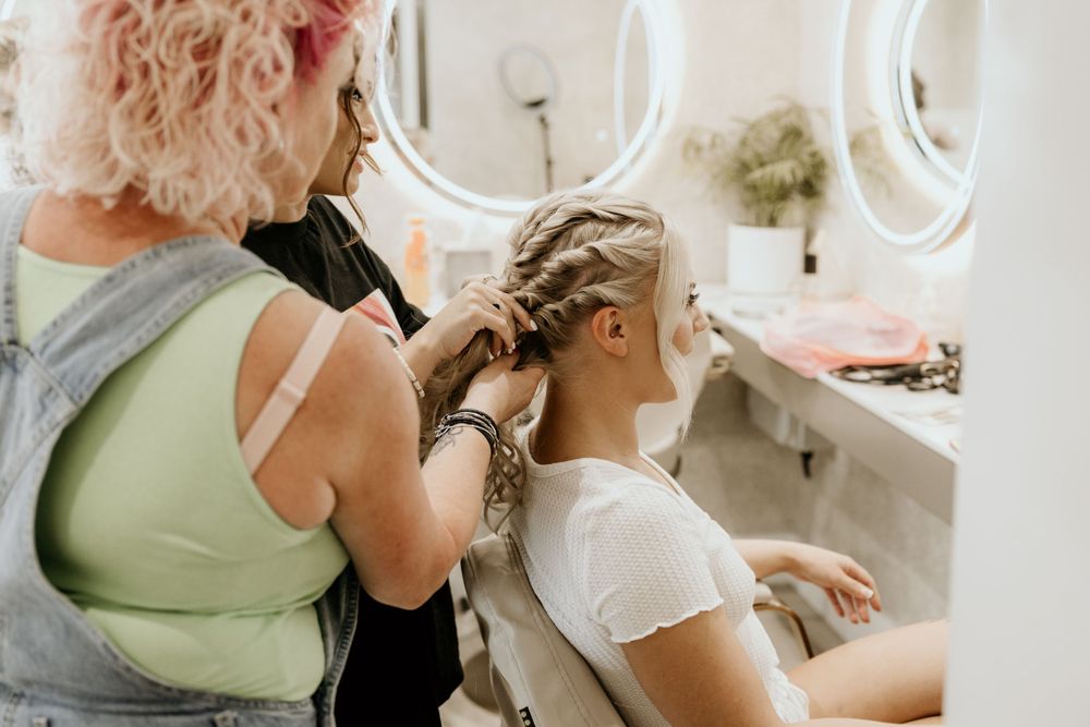 Behind the scenes of wedding day hair styling preparations.