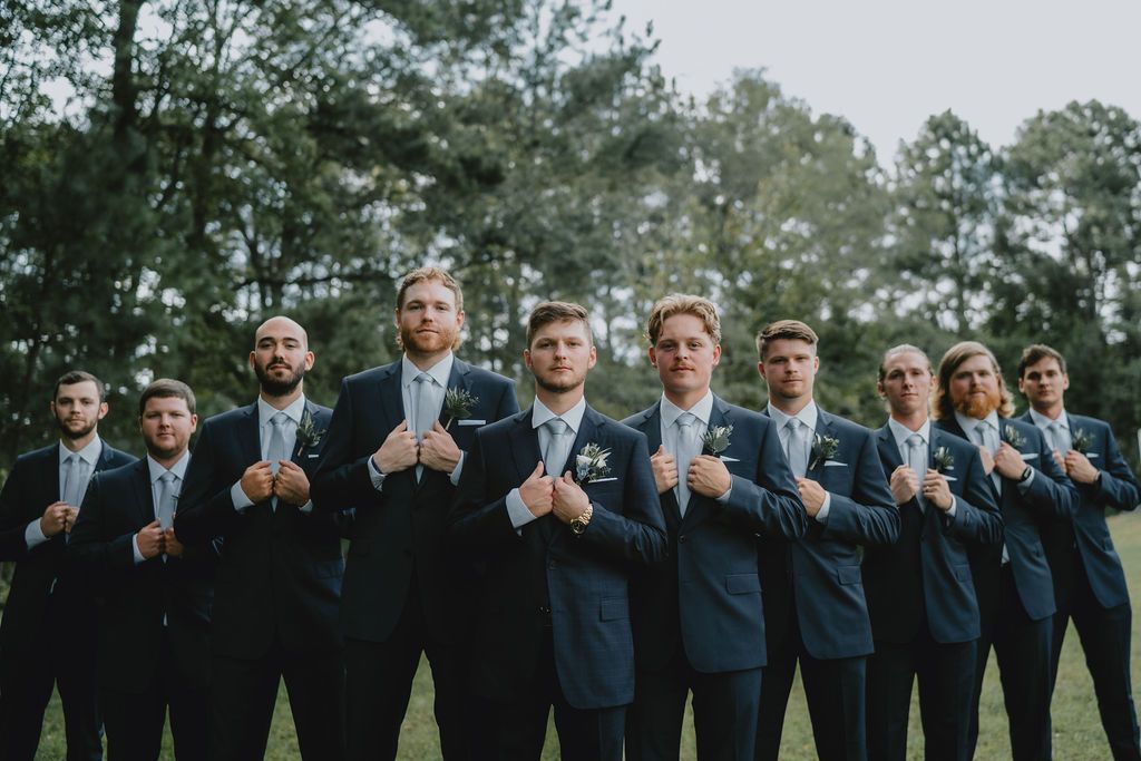 Groomsman posing at daisy hill venue