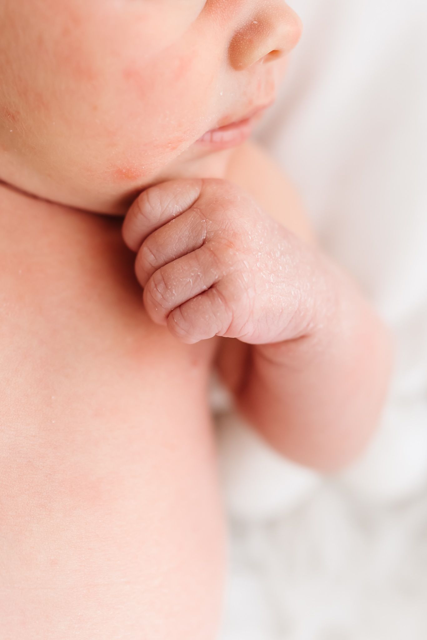 Macro photography series showing tender details of newborn features.