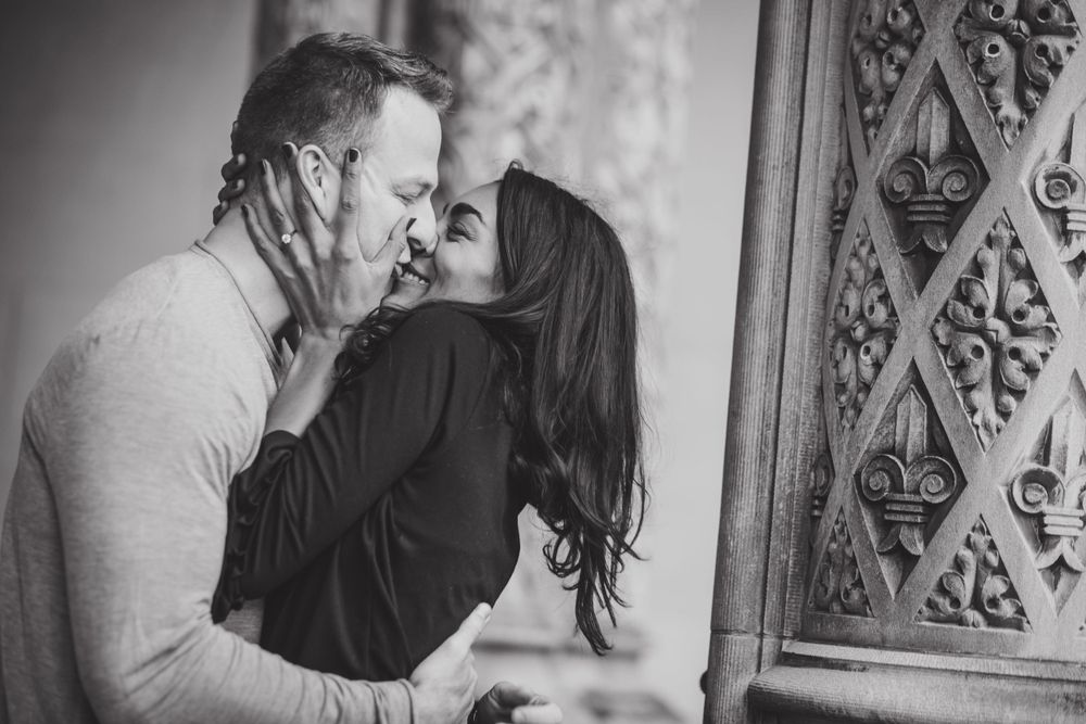 Romantic black and white wall portraits showing tender moments between a couple.