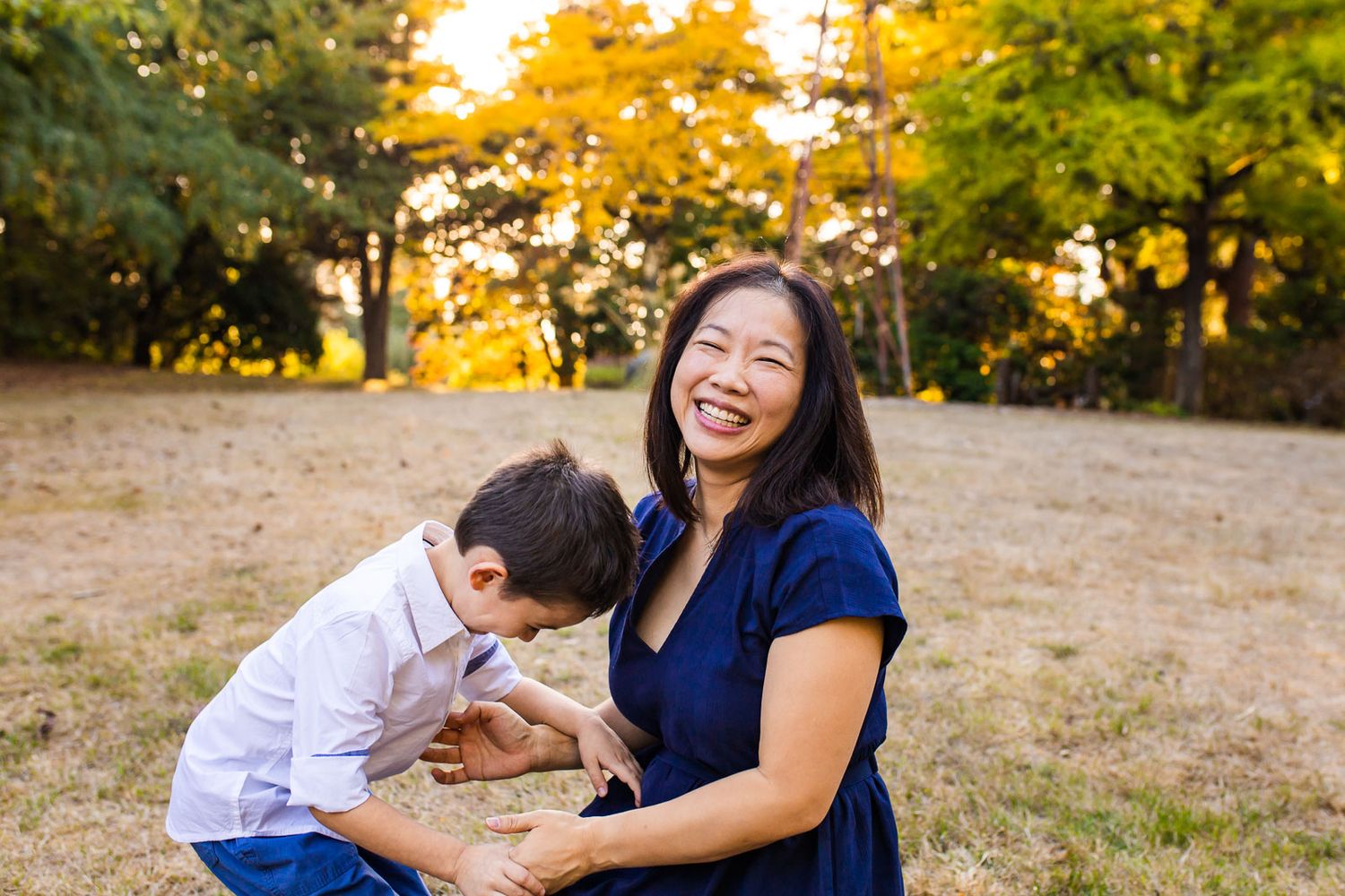 Son playing with mom at McAuliffe Park