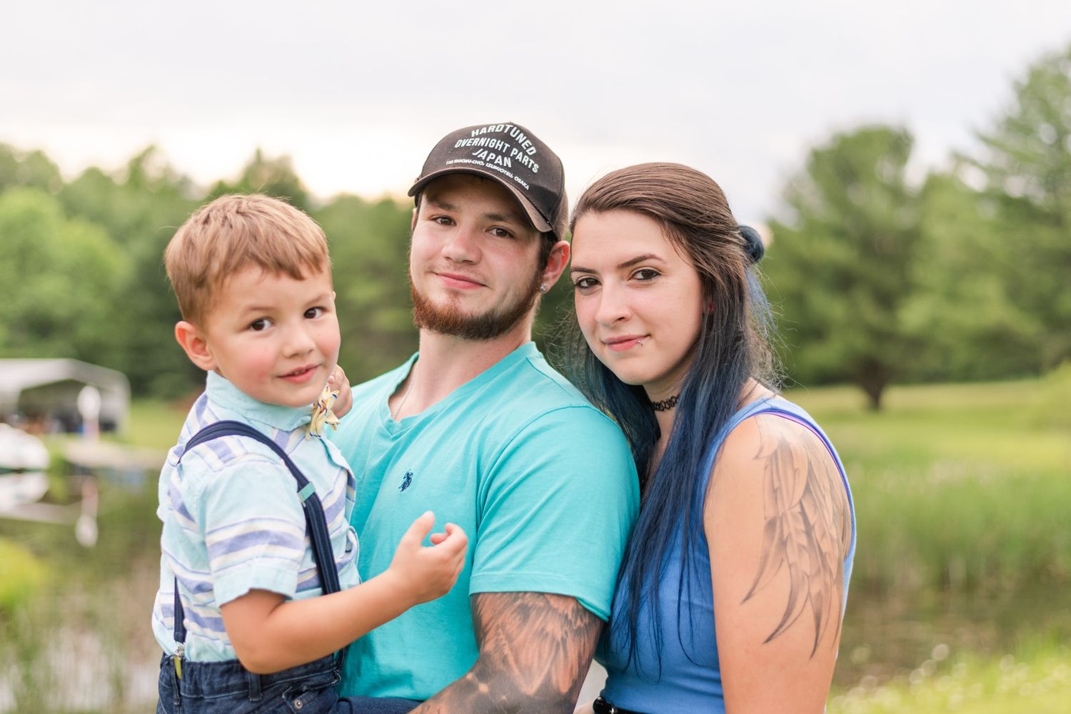 Family standing in front of pond in Clarion Pennsylvania