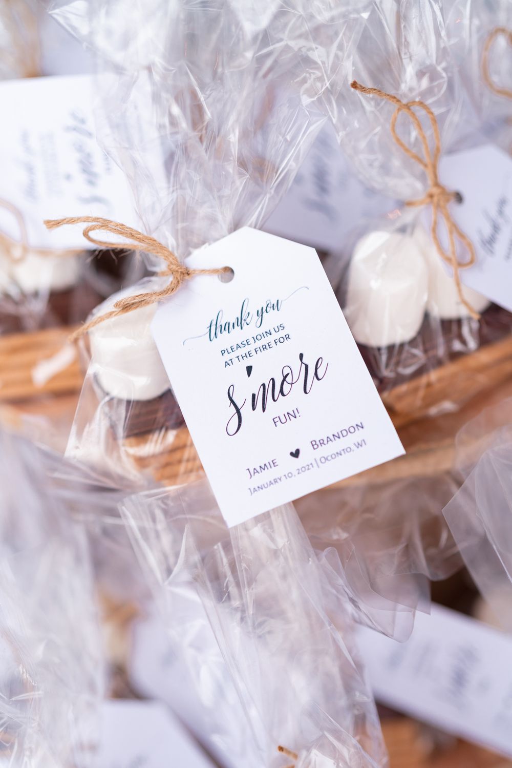 Wedding favor bags with thank you tags tied with twine string.