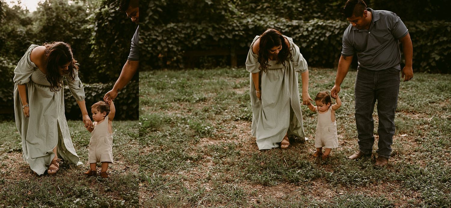 Family walking together in garden setting during sunset photoshoot.