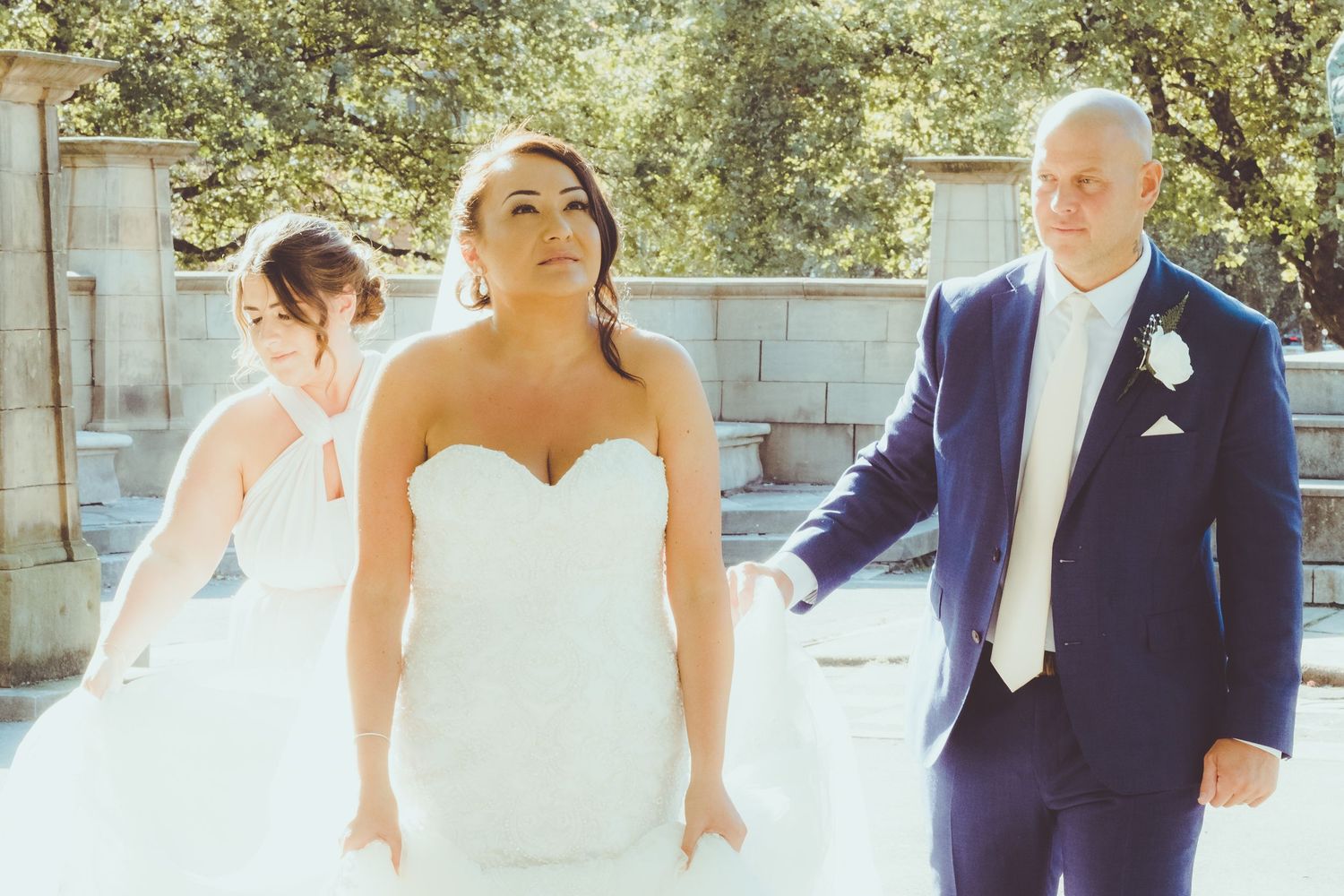 Candid photograph of bride groom and bridesmaid in Liverpool