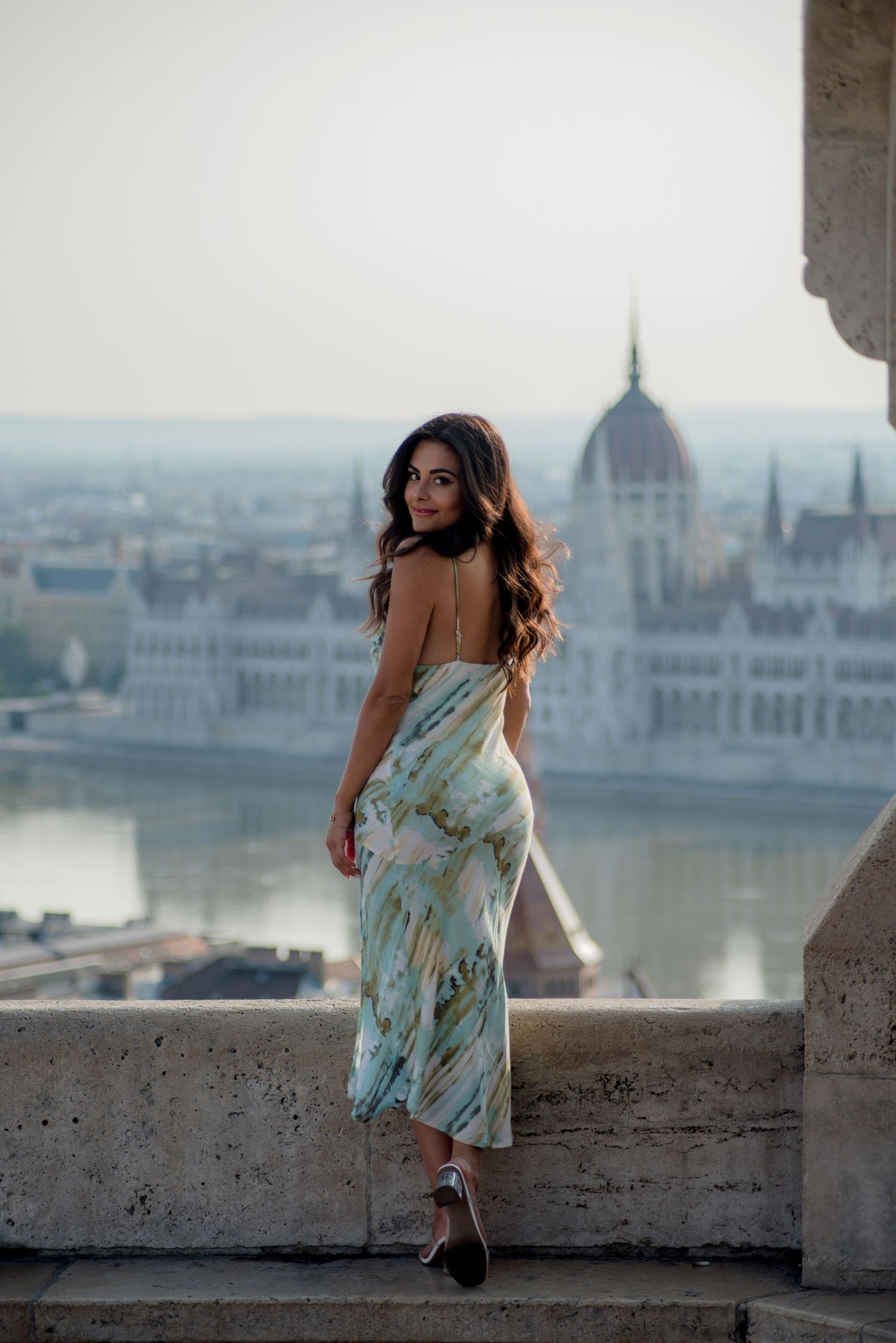 girl posing for a photo shoot at fisherman's bastion with the budapest photographer