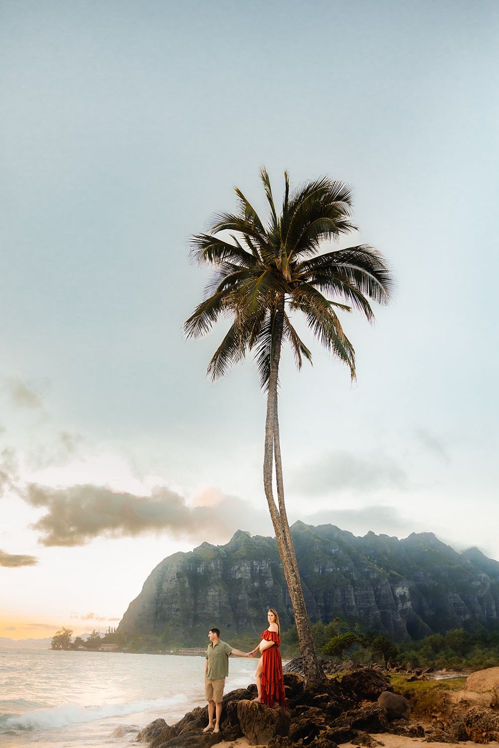 Oahu Maternity Photographer captures an expectant mother at Ka'a'wa beach on Oahu.