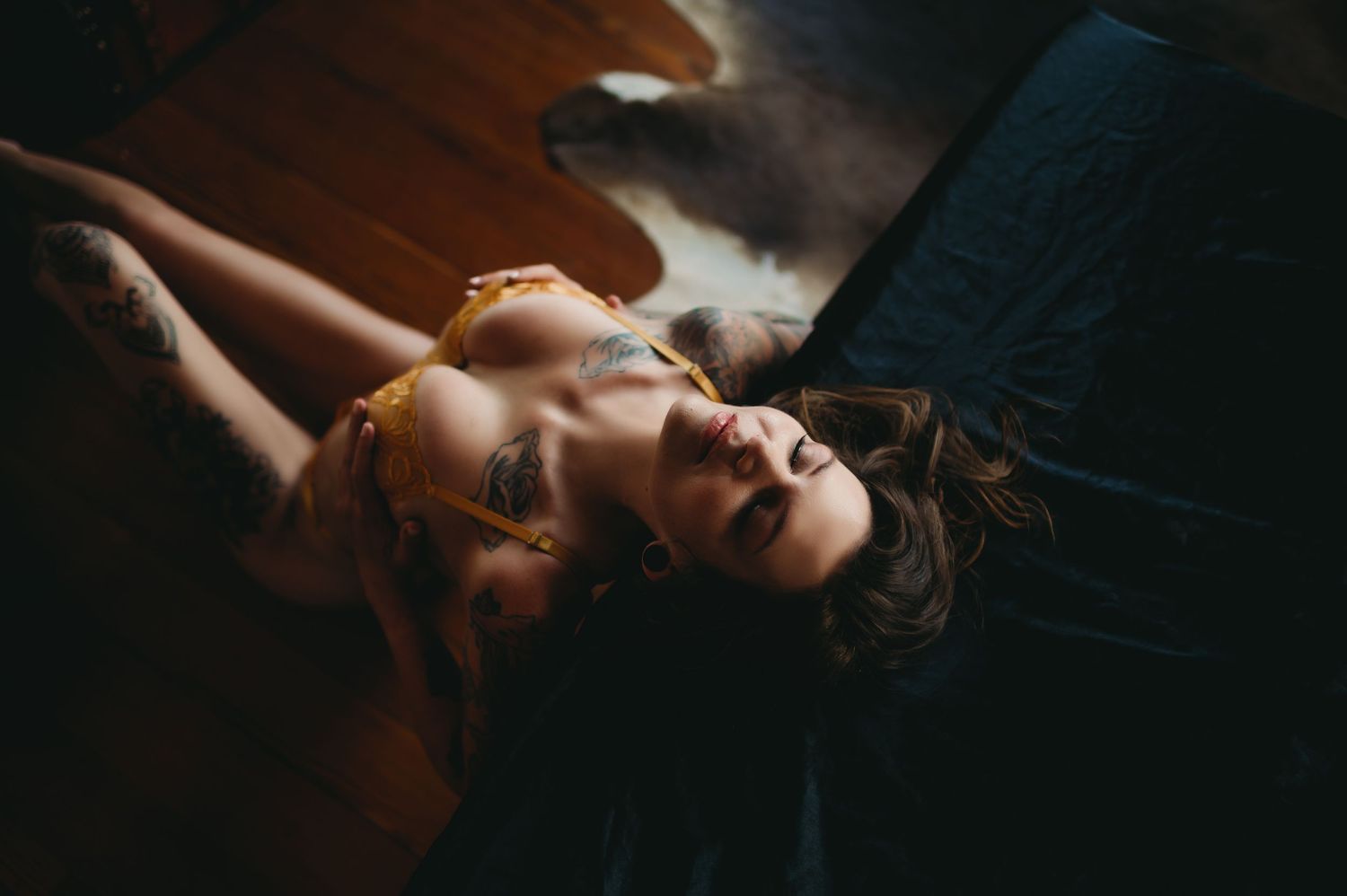 Confident woman in a Fishers boudoir shoot celebrating self-love and grace.