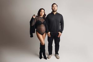 husband and wife at maternity session