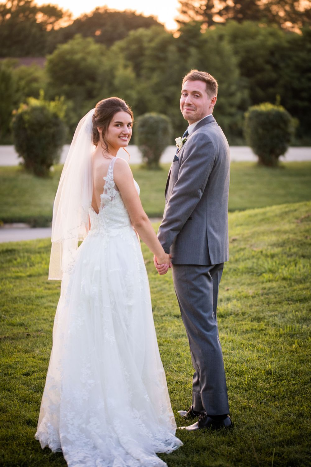Bride and groom at golden hour at Stratford Country Club wedding