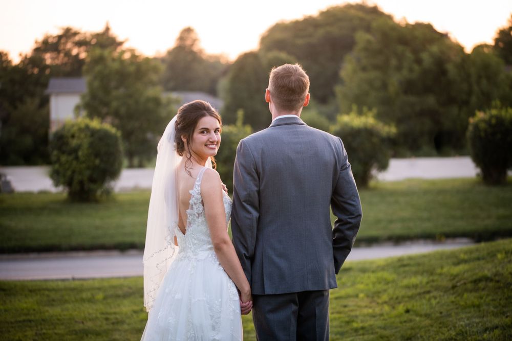Bride and groom at golden hour at Stratford Country Club wedding