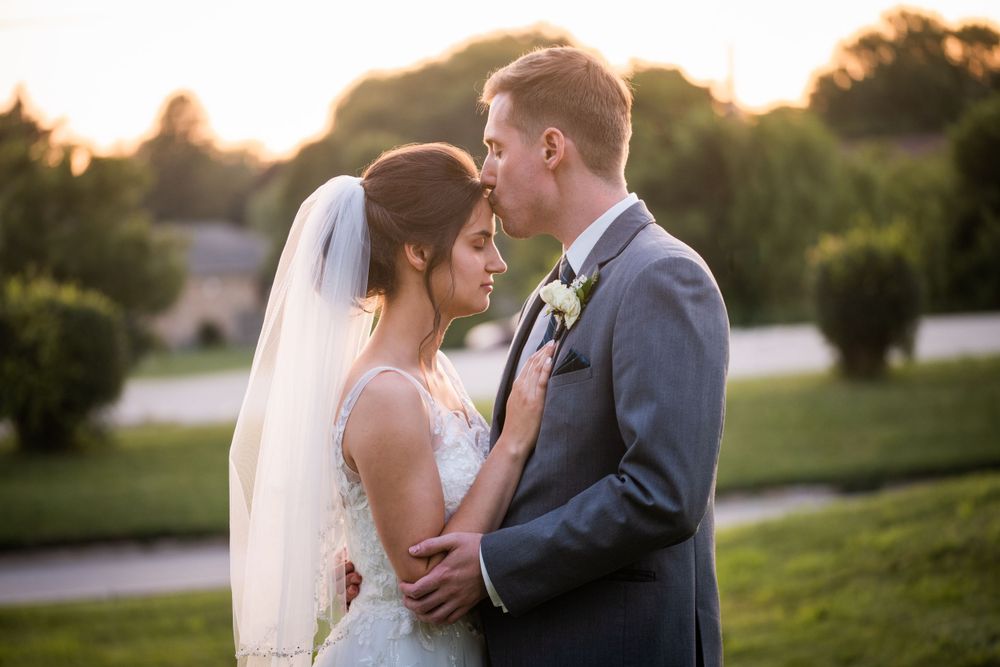 Bride and groom at golden hour at Stratford Country Club wedding