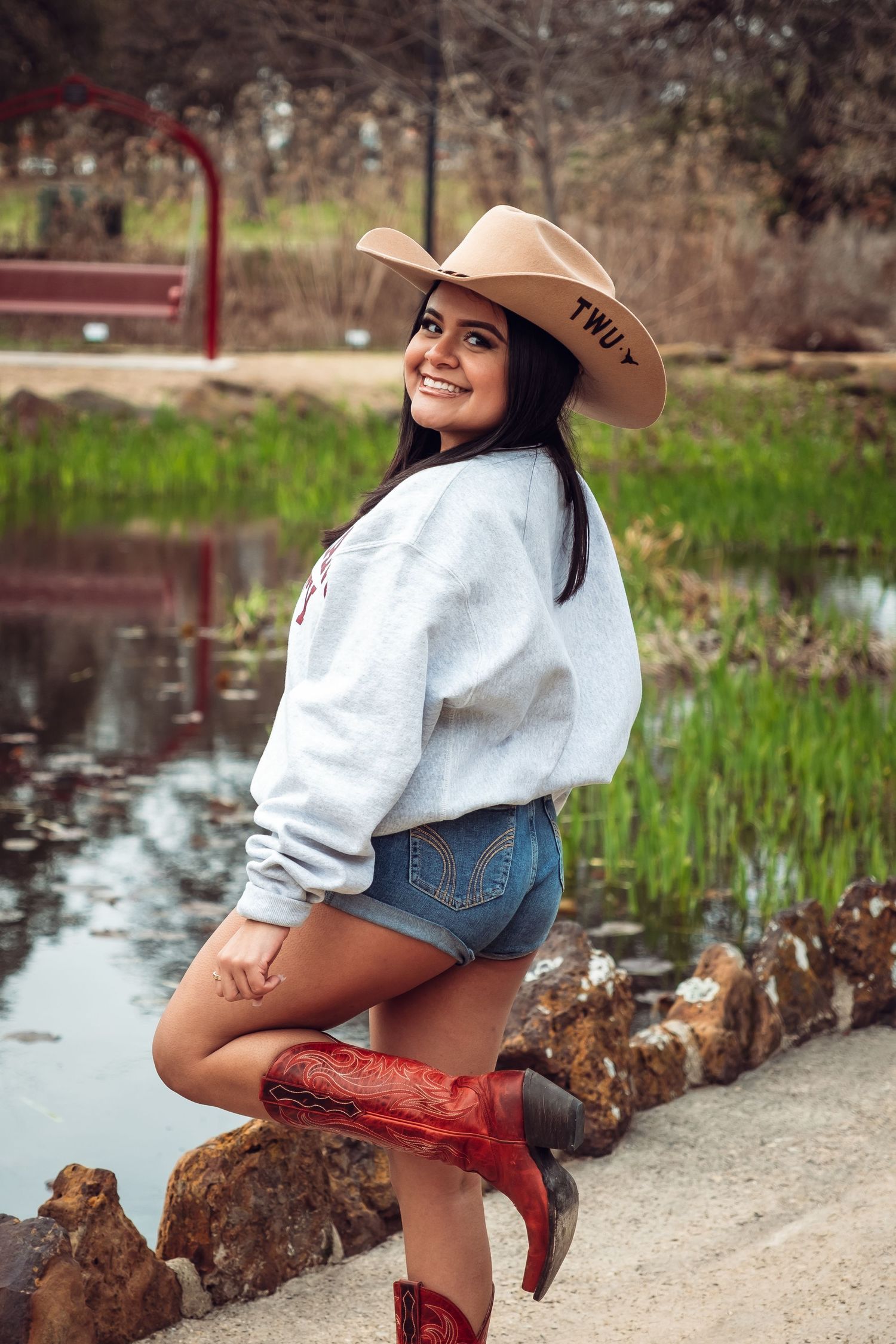 Senior photo of college grad from Texas Woman's University in Denton, Texas at TWU.