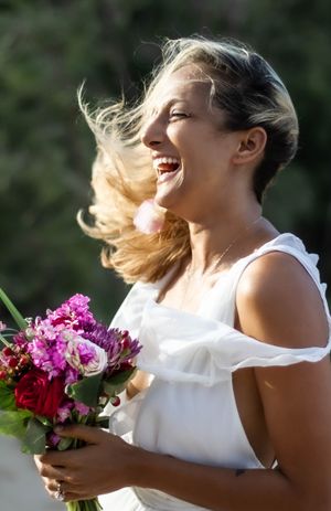 Bride in sunset, flowers, bouquet, Elopement photography.  Wedding photography, Sunset wedding photography, Dorset Wedding photography