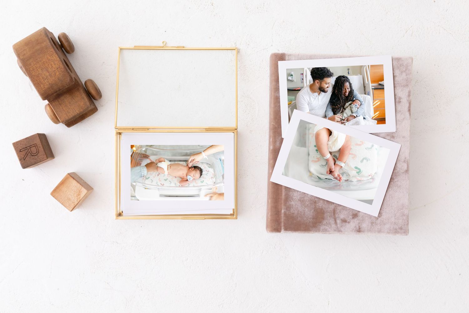 photo album with fresh 48 baby photographs on top