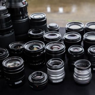 Large selection of Fuji camera lenses shining and looking gorgeous