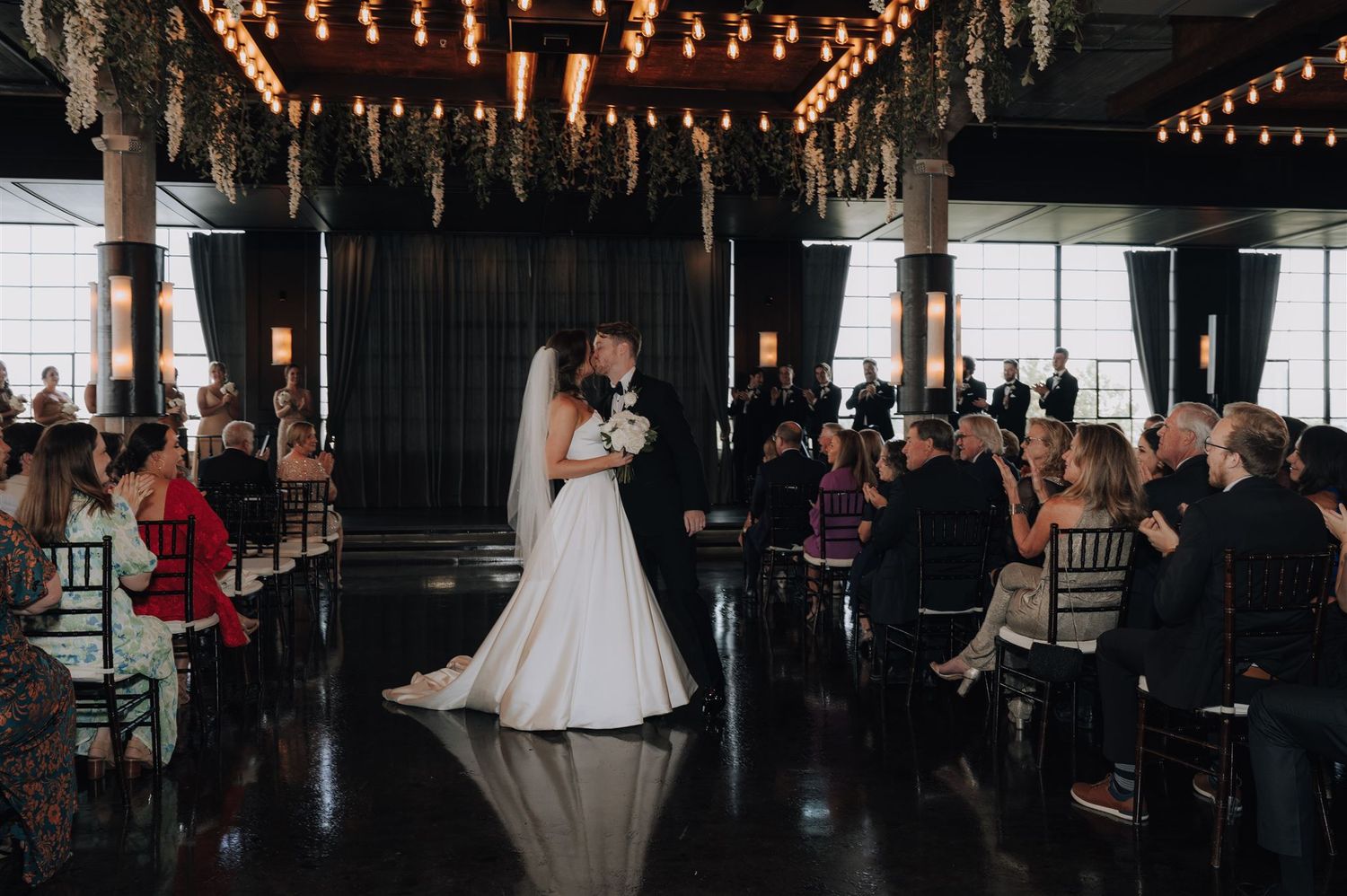 Modern wedding at The Astorian in Houston, Tx. Brides dress is from Anna Be Bridal.