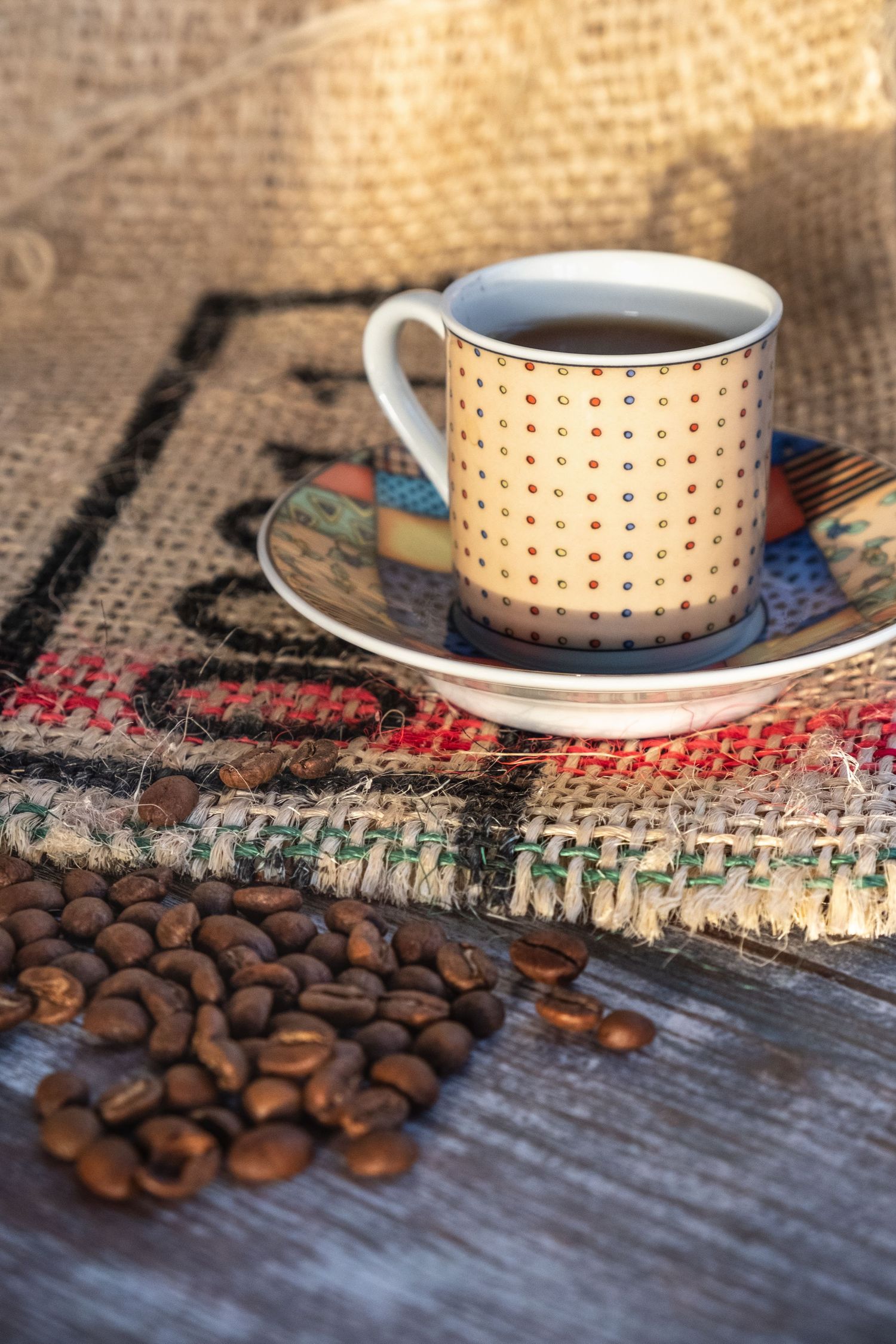 Close up of an espresso coffee and coffee beans