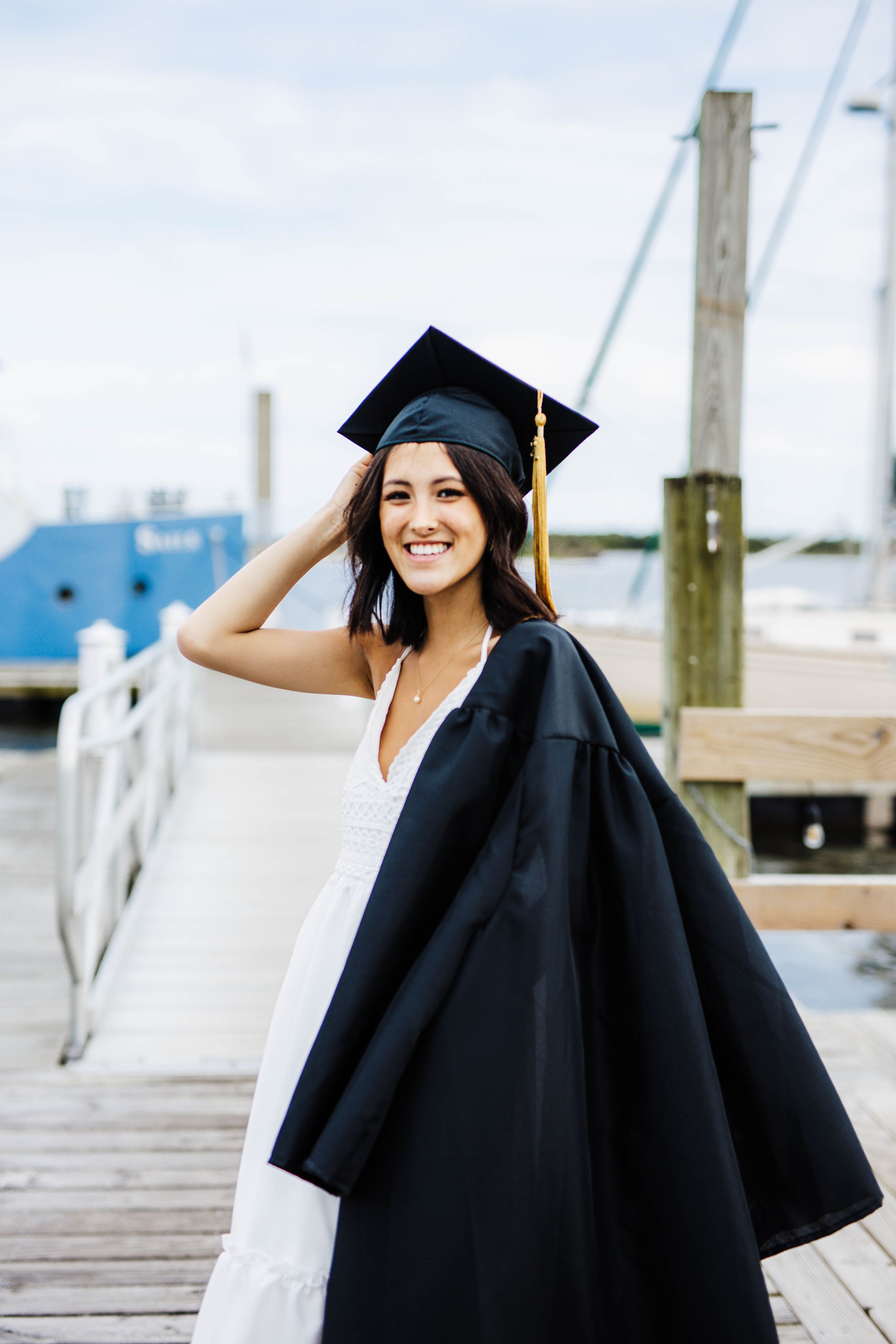 cap and gown photos in downtown Swansboro nc. Swansboro nc photographer.