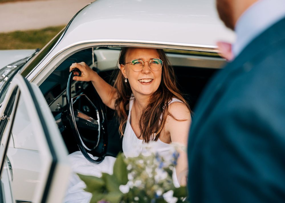 Classic car interior shot during a wedding photoshoot.