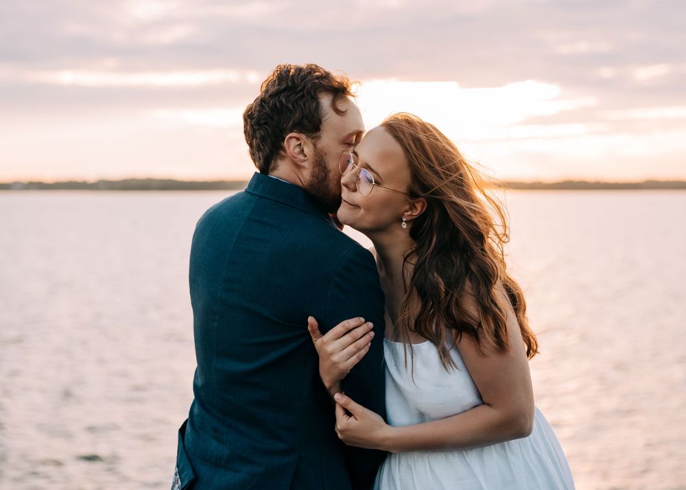 Romantic sunset moment captured by the water.
