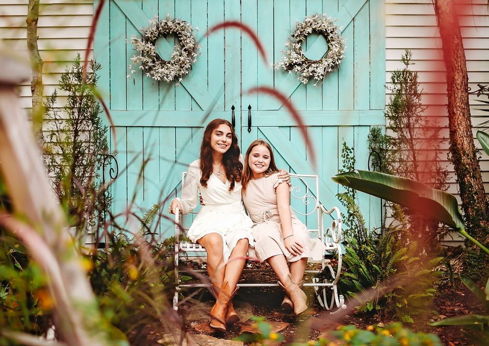Sisters taking photos