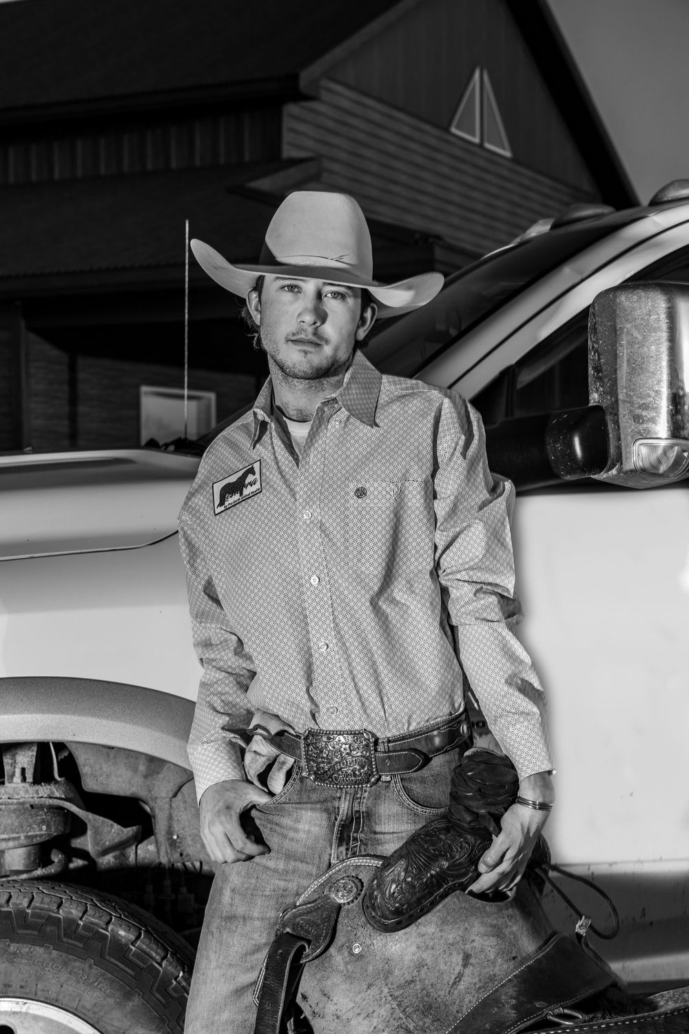 A black and white portrait series showcasing western style clothing and cowboy attire.