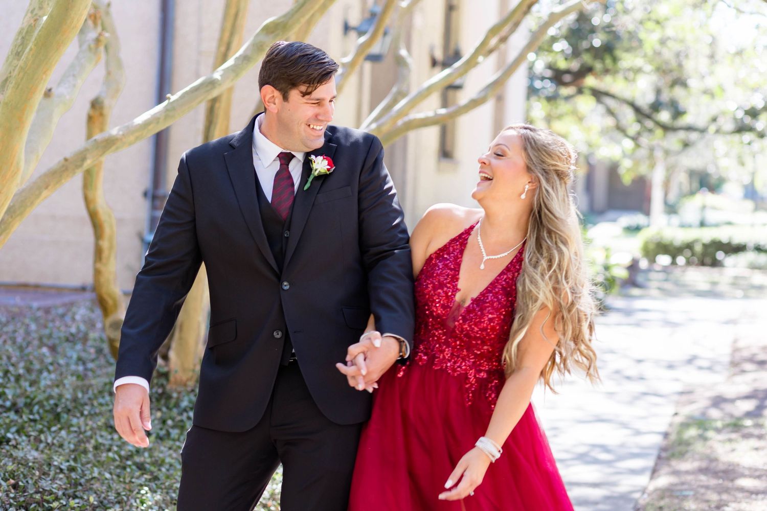 bride and groom laugh