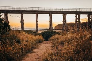 golden hour sunset at Kilkunda in Victoria at trestle bridge by Tasmanian Landscape Photographer Joss Jensen