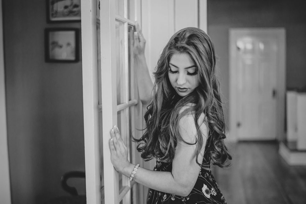 black and white. girl looking down her shoulder. Memory Lane Photo Spot. Mission, Texas