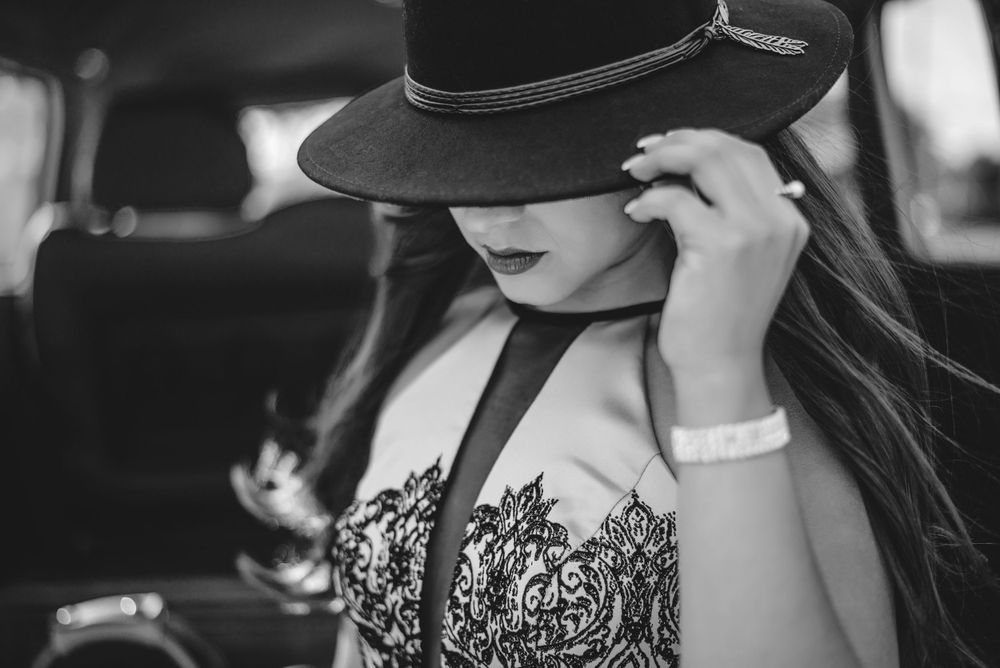 girl wearing a pachuco hat. black and white. Memory lane photo spot. Mission, Texas. Wedding photography