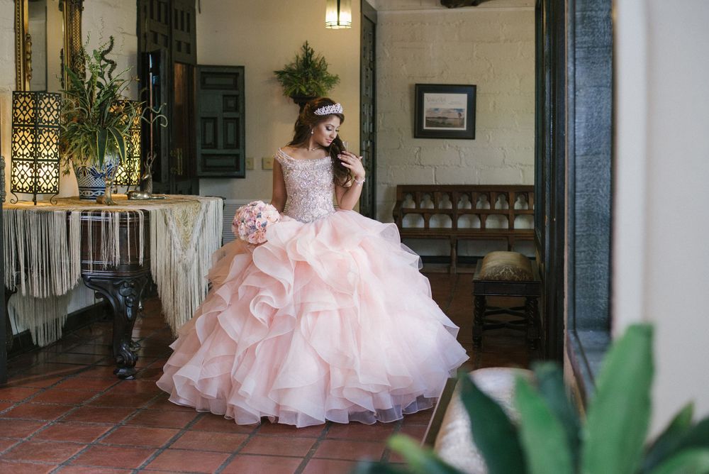 girl wearing quinceanera dress. La Quinta Mazatlan. McAllen, Texas. Wedding photography