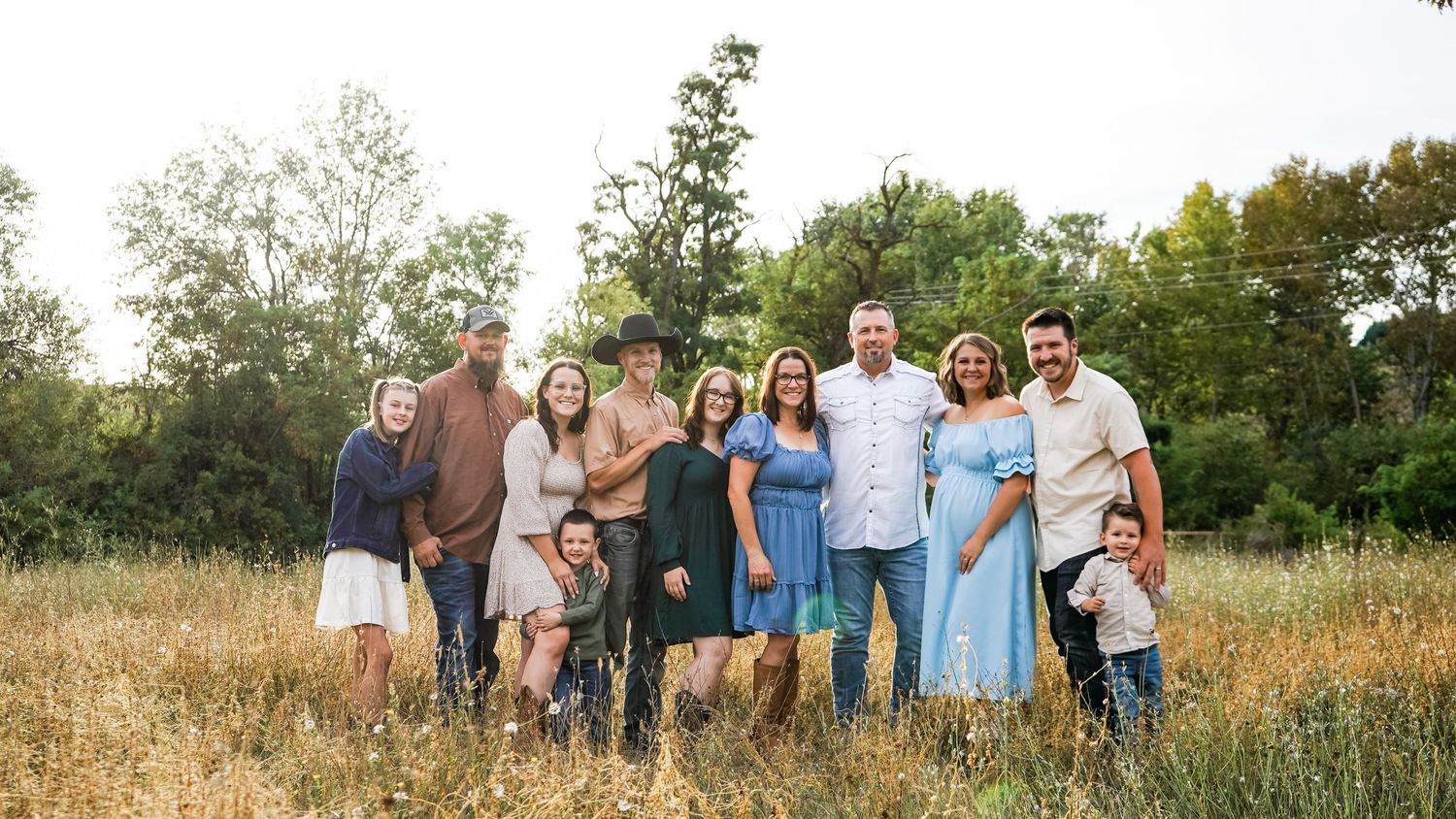 Wide landscape photo series showing groups of people gathered in a sunny outdoor field setting.