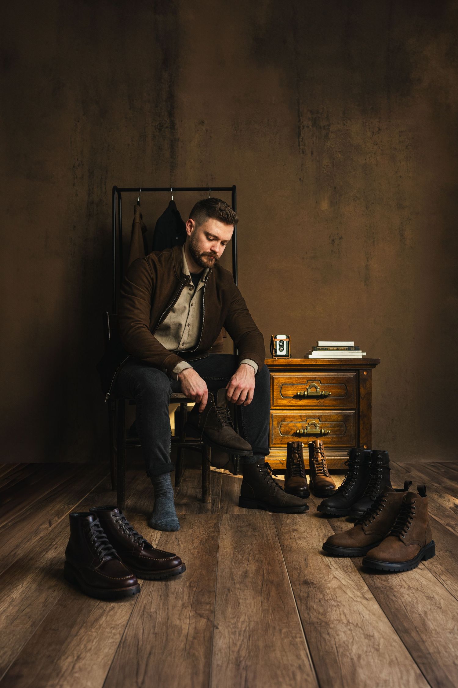 A sequence showing boots being laced up on wooden flooring with vintage decor.