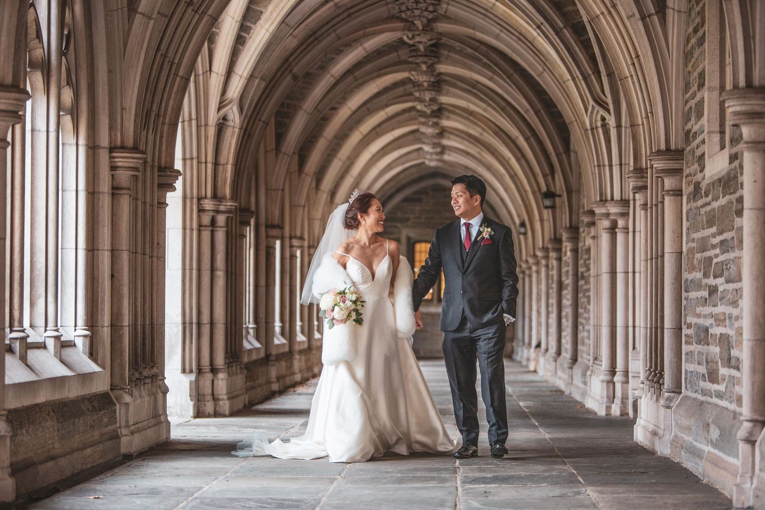 Bride and Groom Gazing Into Each Others Eyes Inside Archway Wedding Day Princeton University in  New Jersey