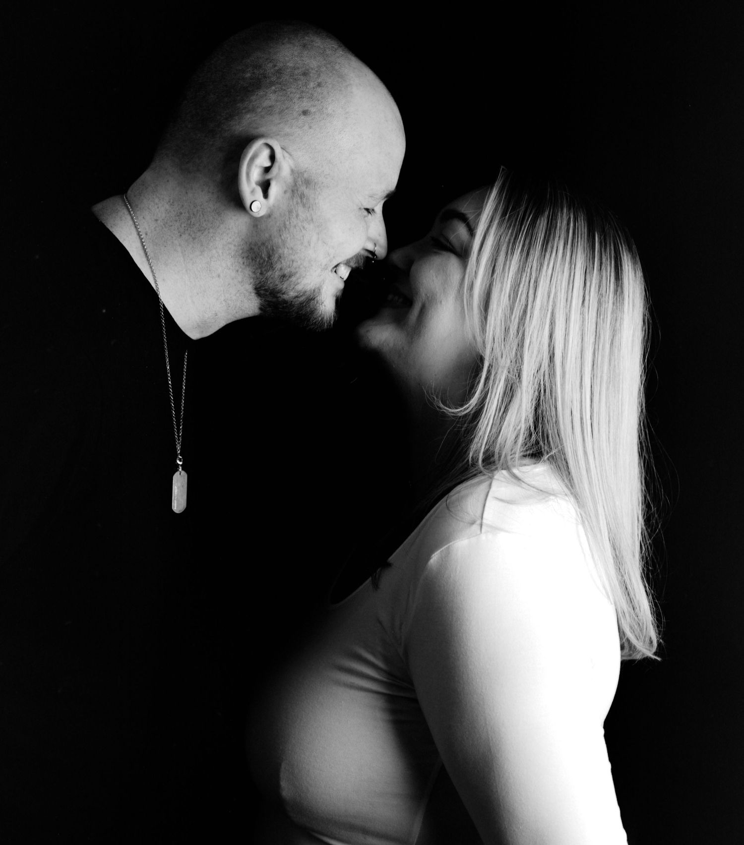 Young couple photographed using black and white under the lights in my studio