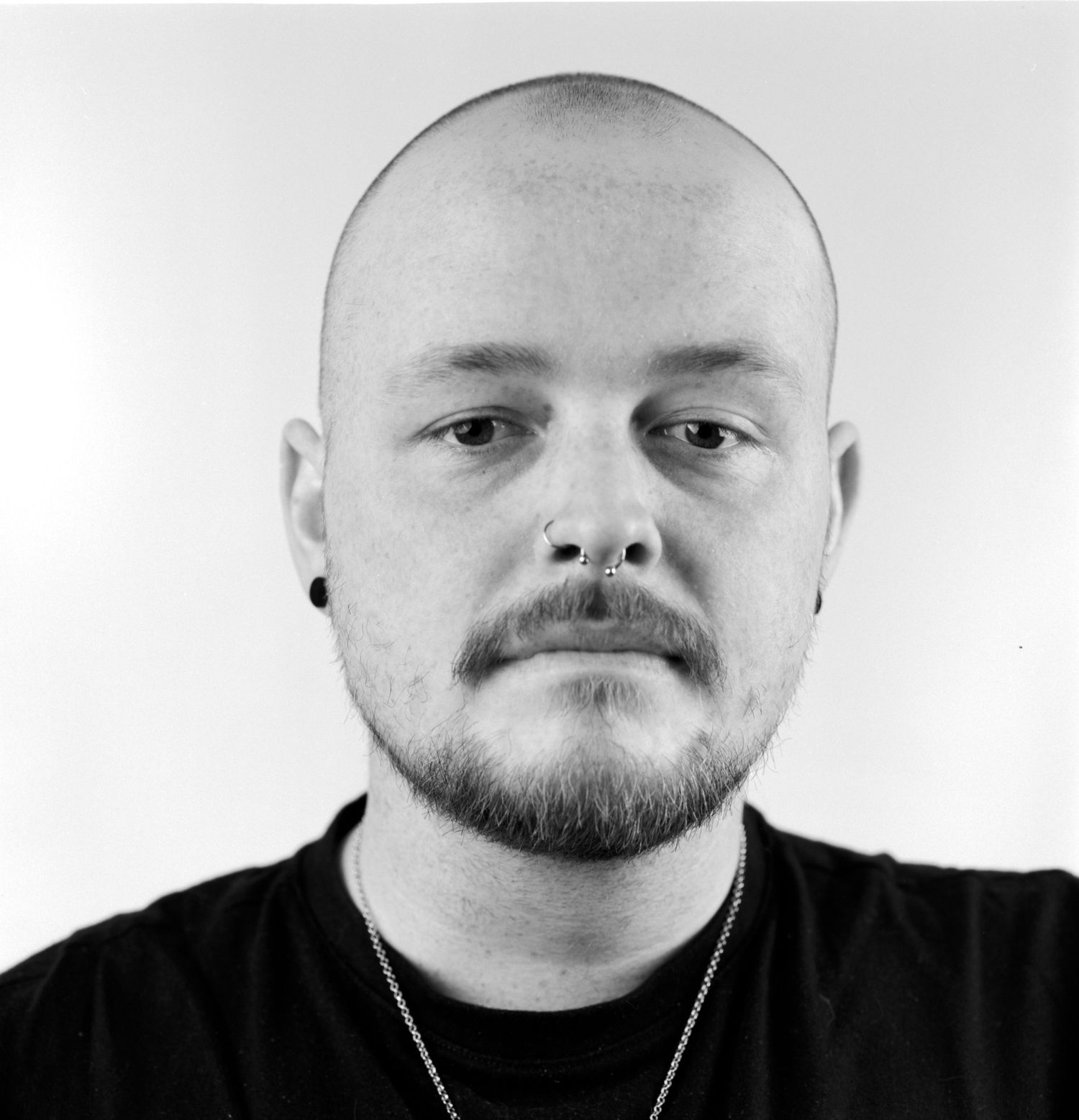 Black and white head portrait photograph captured in the studio