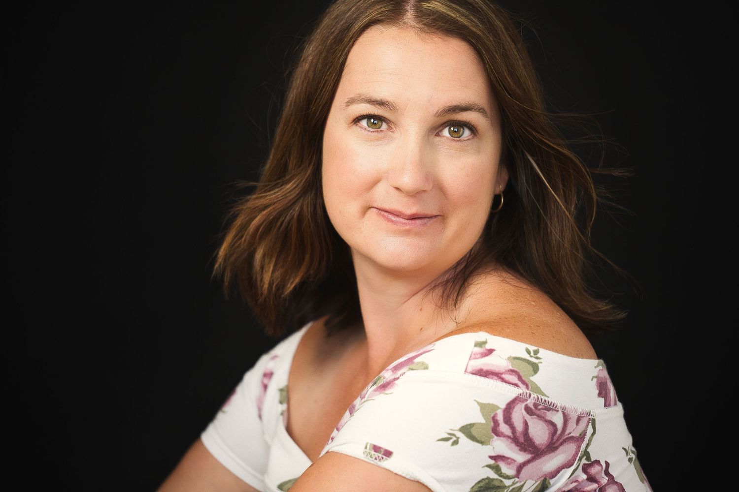 Beautiful portrait of a woman's headshot.  Fill out this form to schedule a consultation call to talk about your project
