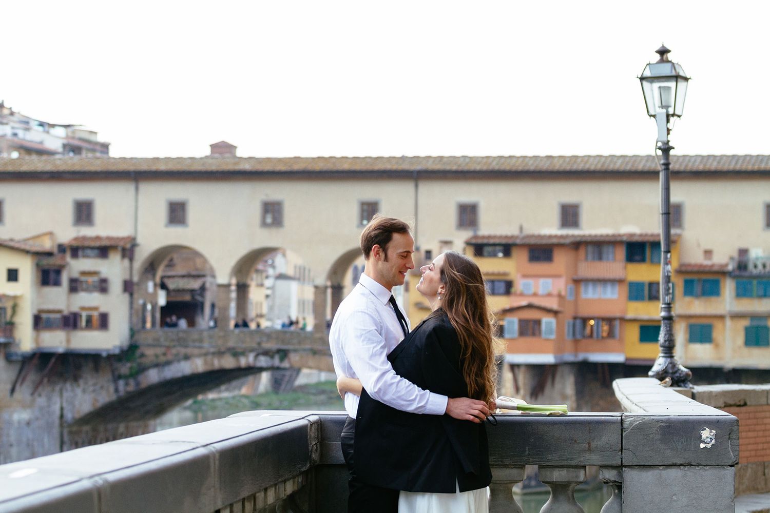 Florence wedding photographer couple portraits by Ponte Vecchio Florence