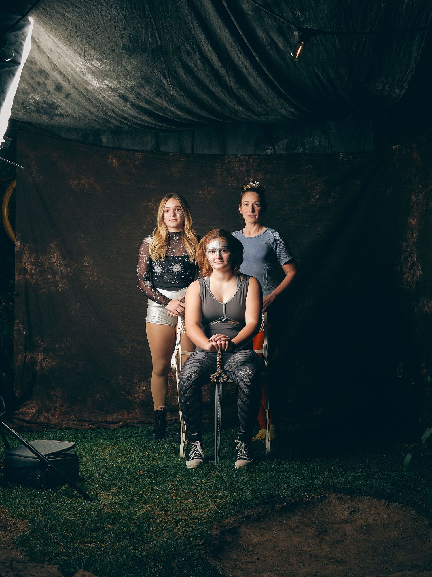 Erin and her daughters pose in my photobooth at Major Arcana 2021