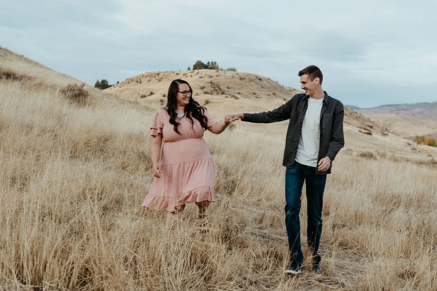 couple holding hands autumn in Idaho