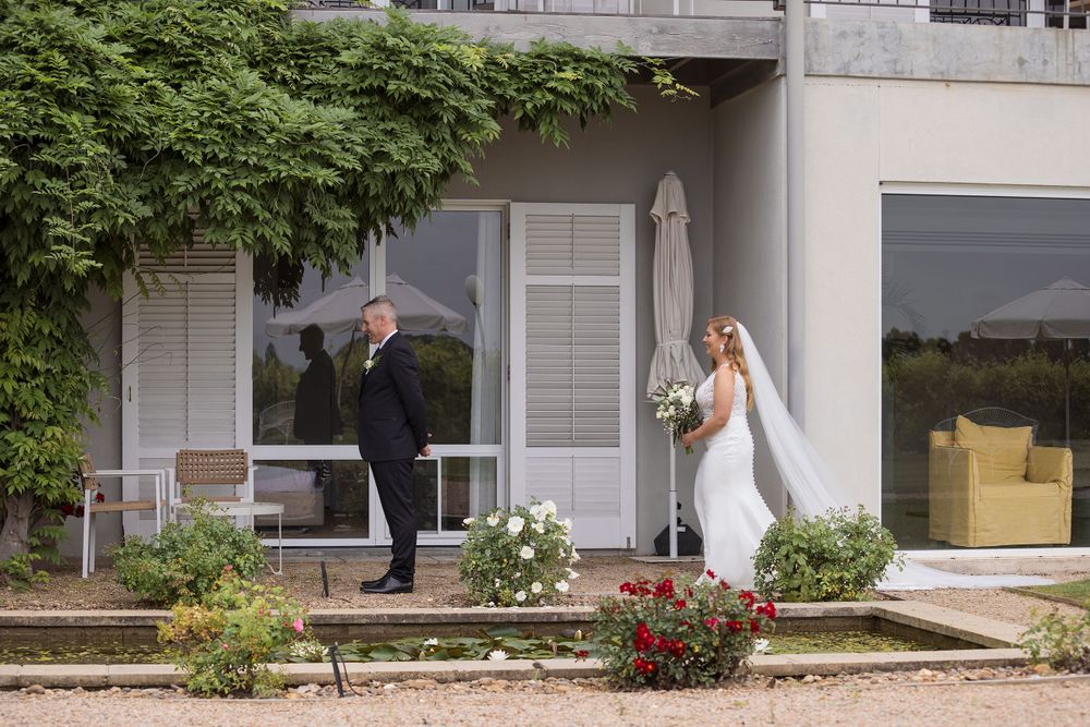 Bride and Groom Enjoying their first sight photos together before their wedding ceremony at Lancemore MIlawa