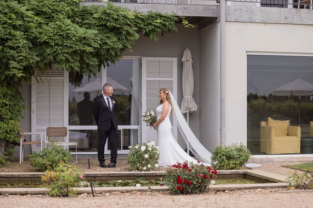 Bride and Groom Enjoying their first sight photos together before their wedding ceremony at Lancemore MIlawa