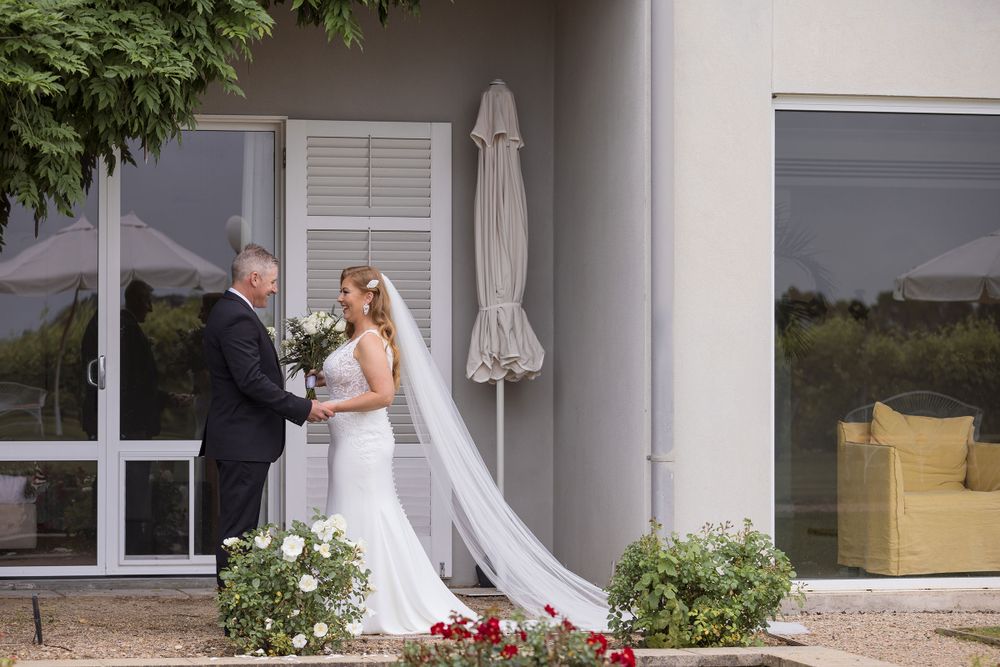 Bride and Groom Enjoying their first sight photos together before their wedding ceremony at Lancemore MIlawa