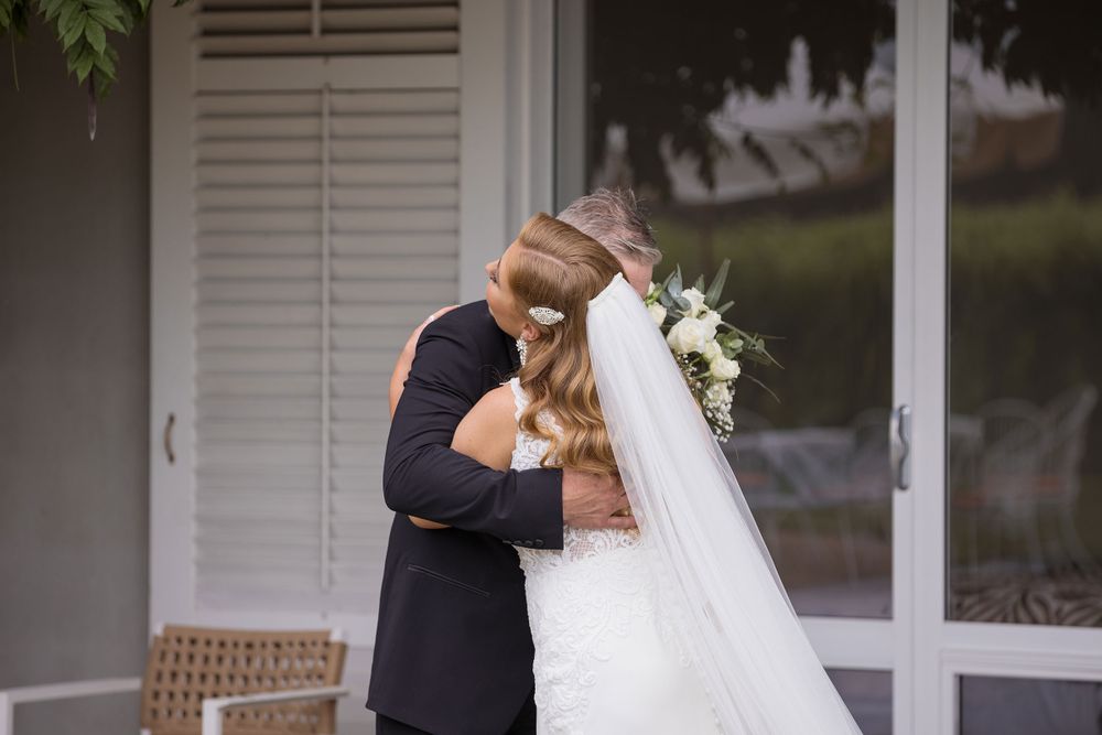 Bride and Groom Enjoying their first sight photos together before their wedding ceremony at Lancemore MIlawa