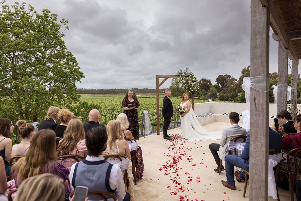 Bride and Groom exchanging their vows during their ceremony at Lancemore Milawa