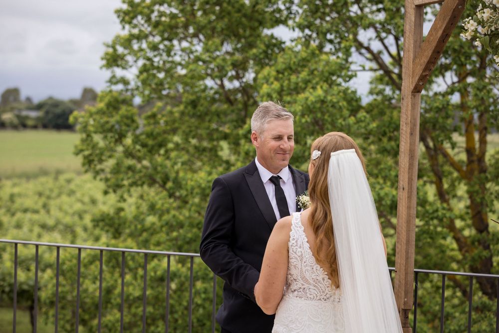 Bride and Groom exchanging their vows during their ceremony at Lancemore Milawa