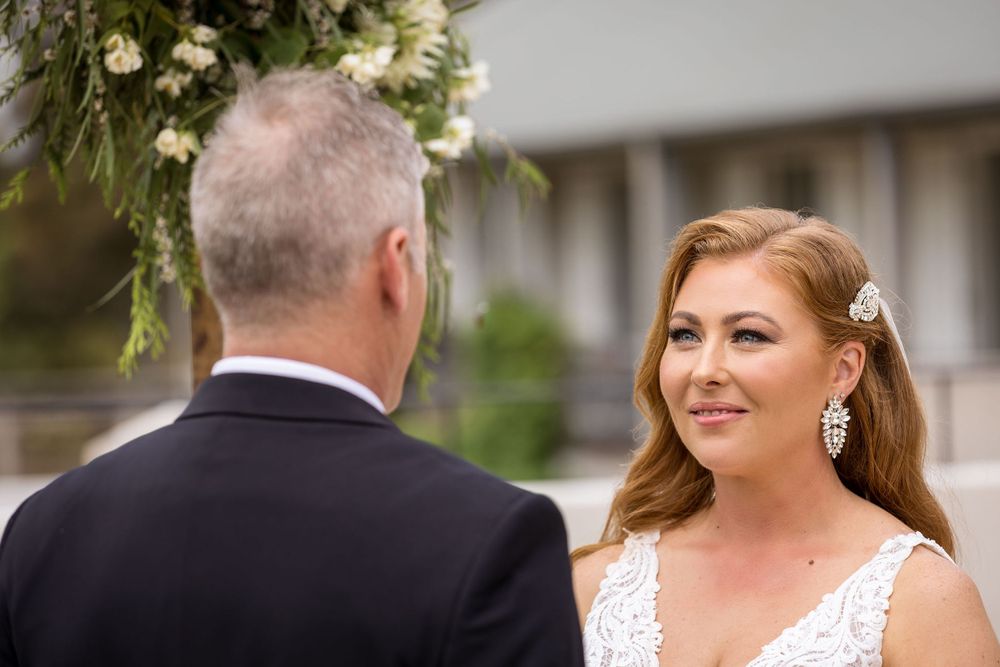 Bride and Groom exchanging their vows during their ceremony at Lancemore Milawa