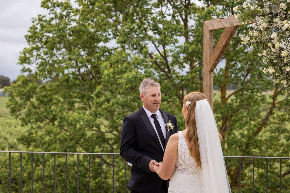 Bride and Groom exchanging their vows during their ceremony at Lancemore Milawa