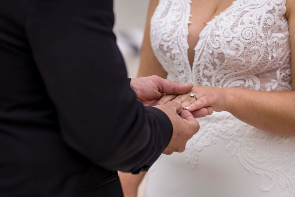 Bride and Groom exchanging their wedding rings during their ceremony at Lancemore Milawa